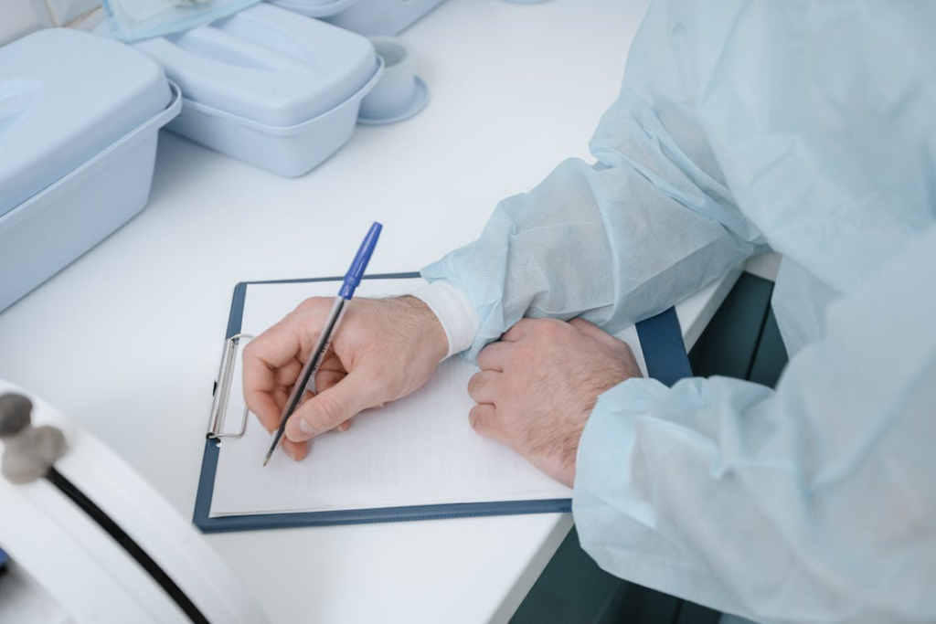 image of a medical staff writing something on a blank paper for topic on pharma virtual assistant tasks
