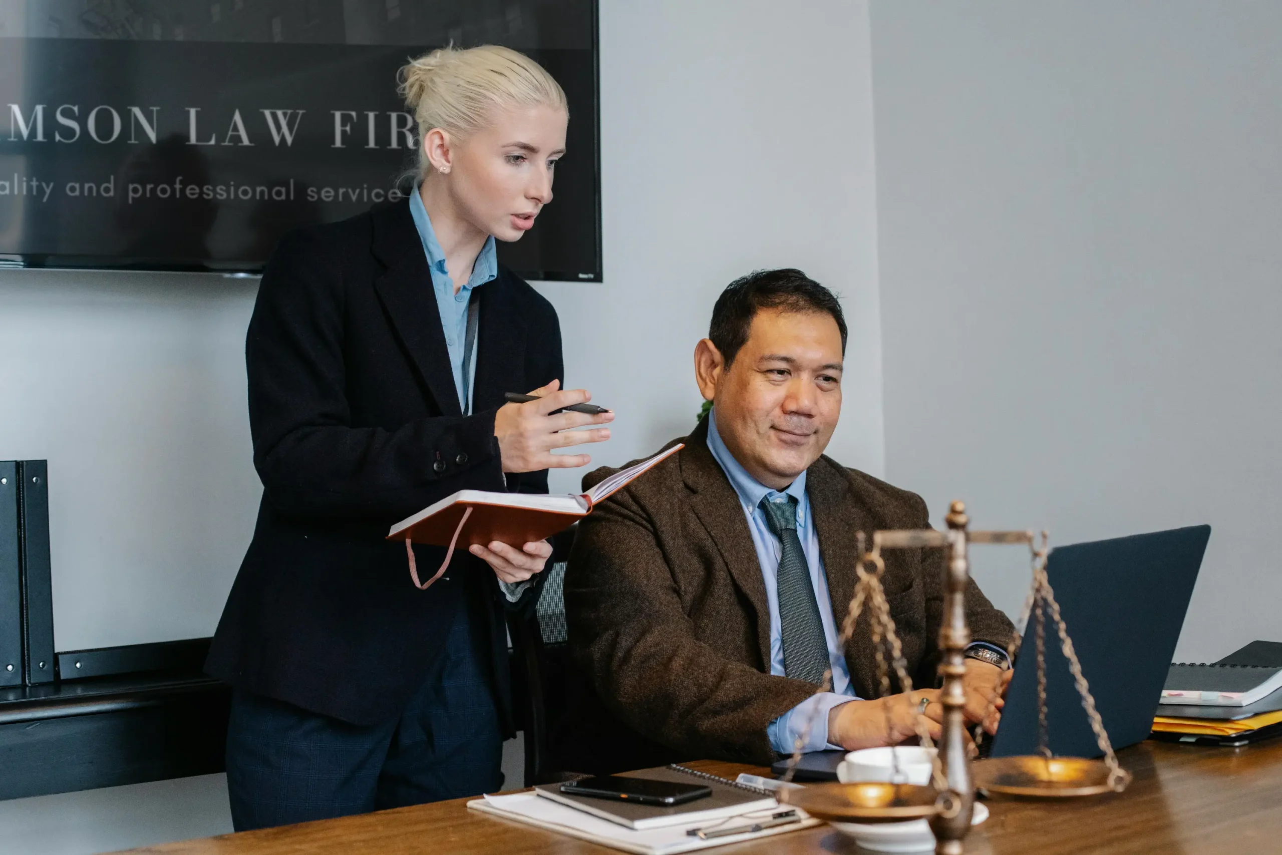 Legal desk with documents and gavel