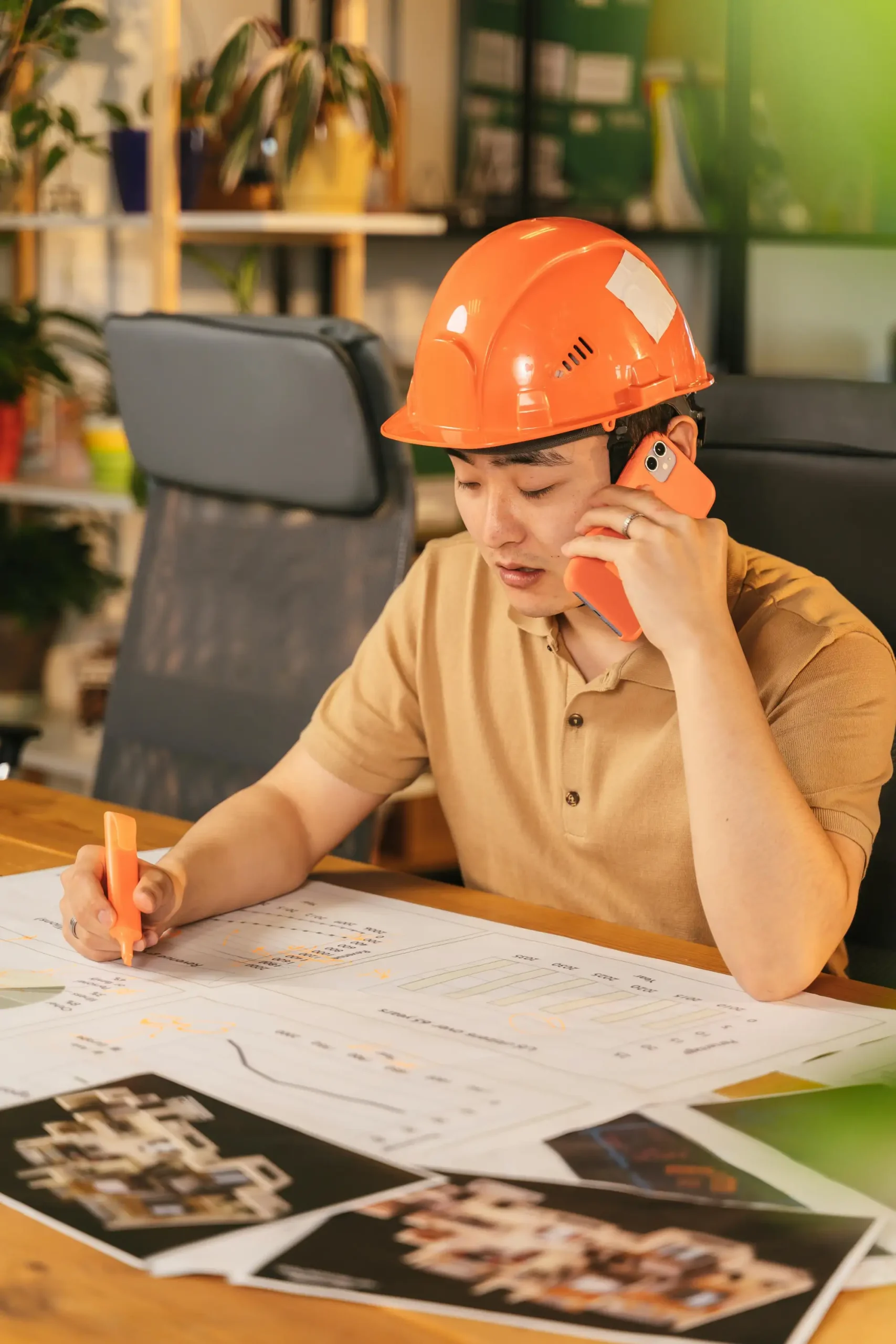 Architect working on construction and engineering design plans