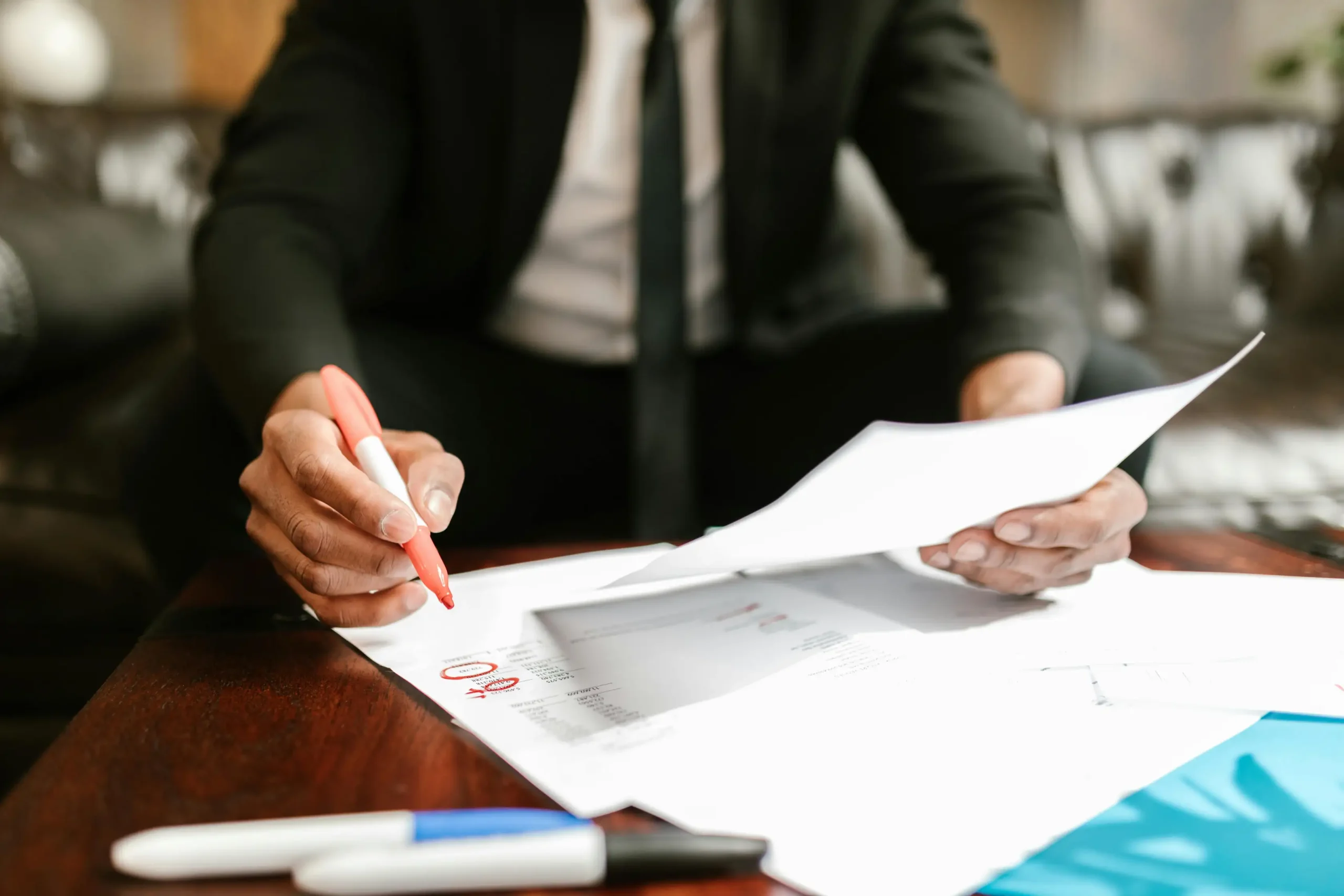 Claims data analyst reviewing insurance datasets and fraud indicators
