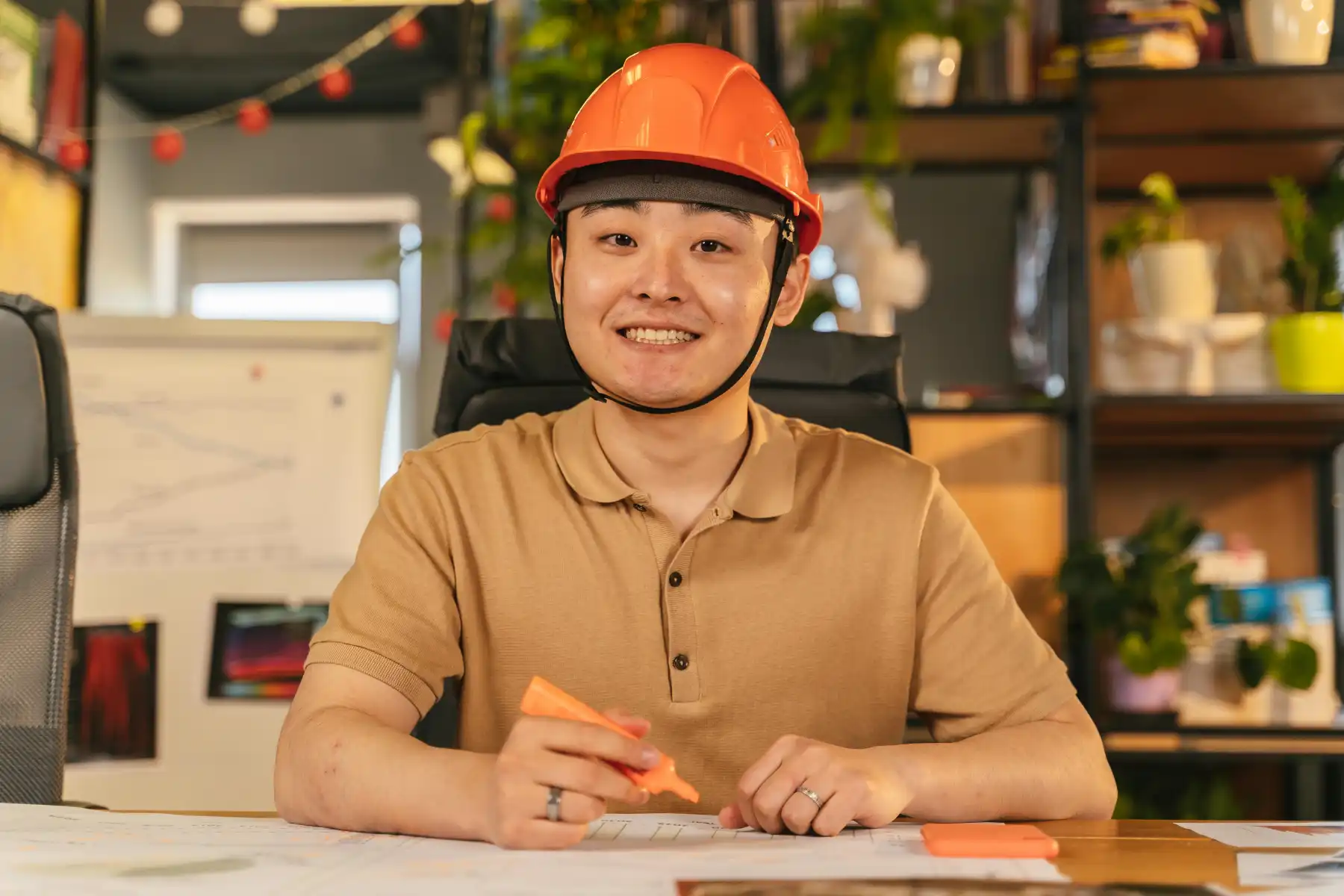 Safety and Environment Coordinator managing compliance records in a manufacturing plant