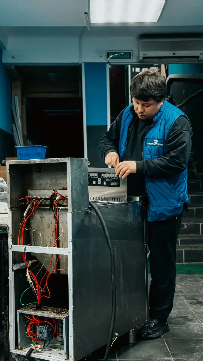 Telecommunications Technician monitoring network infrastructure and troubleshooting systems