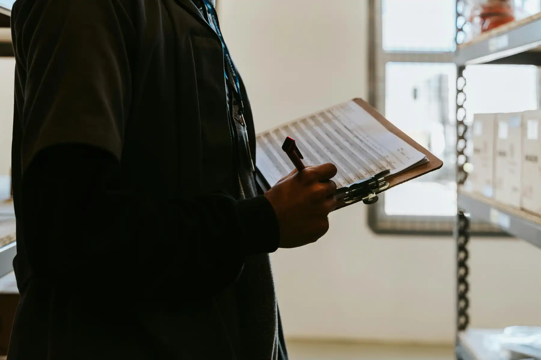 Quality Systems Coordinator managing manufacturing compliance records