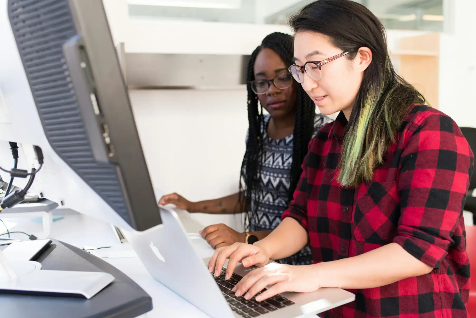 Accountant and Bookkeeper reviewing financial records for a law firm