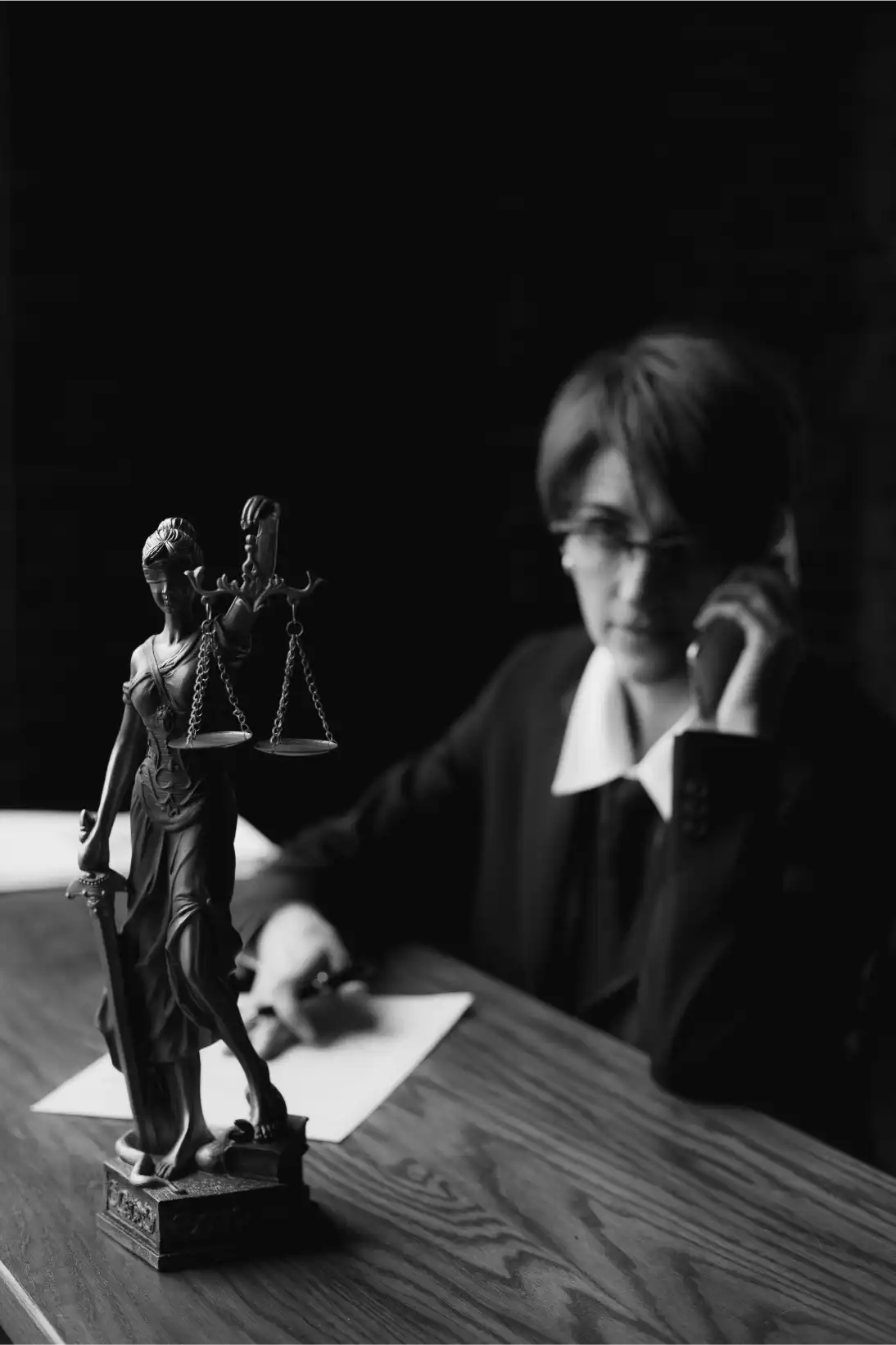 Litigation support specialist reviewing legal documents and case files