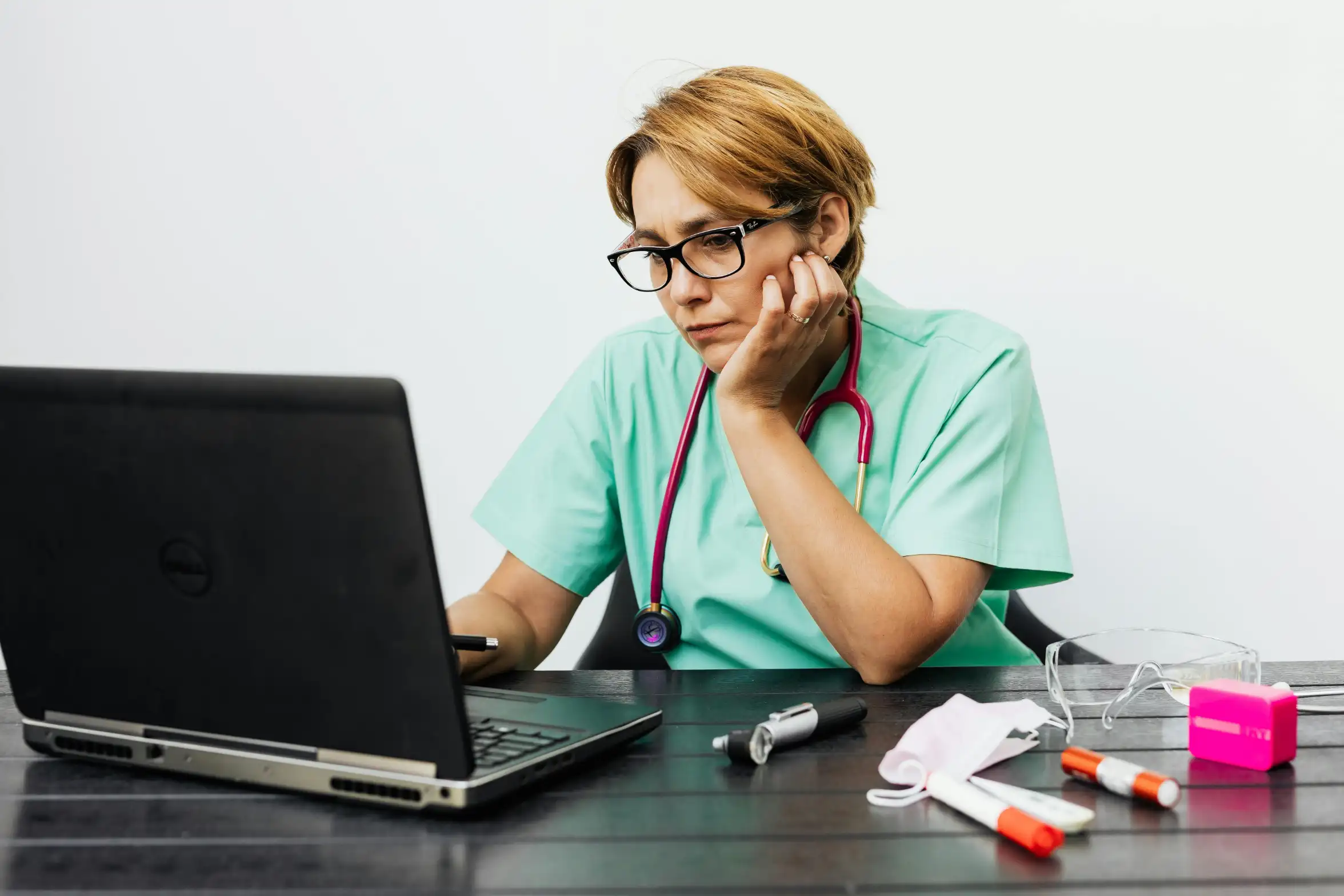 EMR/EHR data entry specialist updating patient health records and medical documentation