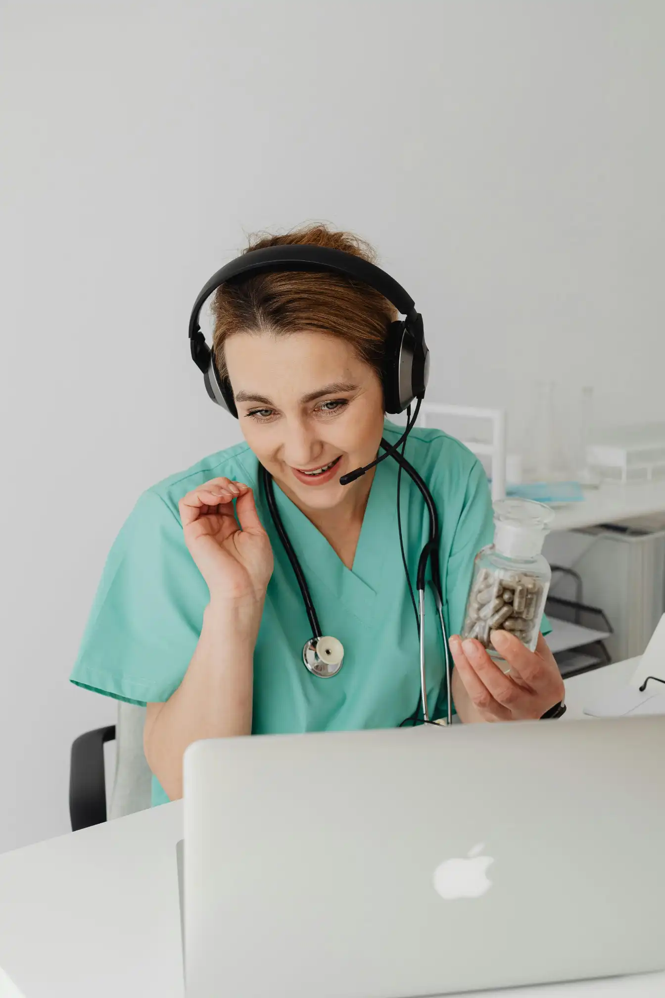 Recruitment officer reviewing healthcare candidate resumes and credentialing documents