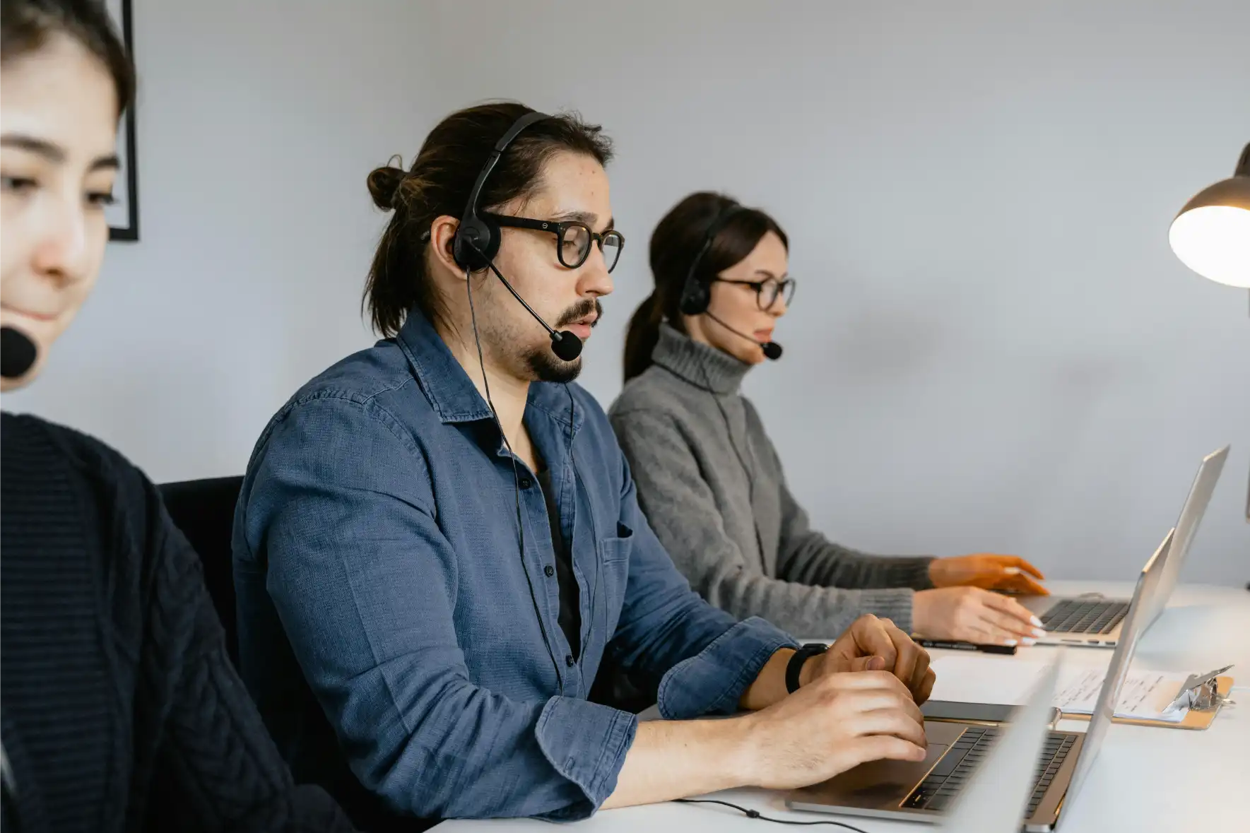 Accountant tracking telecommunications finance records and recurring billing