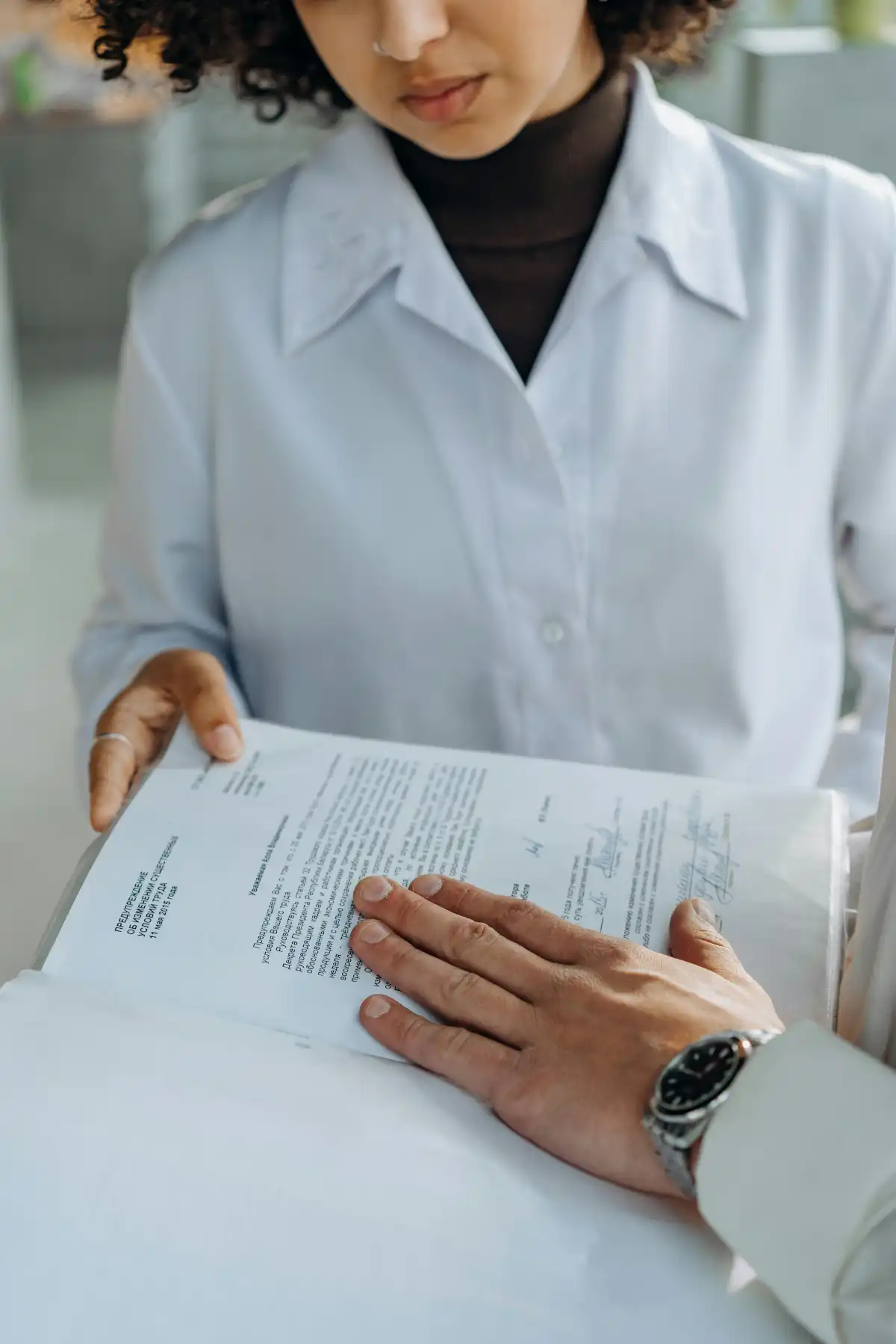 Regulatory affairs assistant working on pharmaceutical documentation