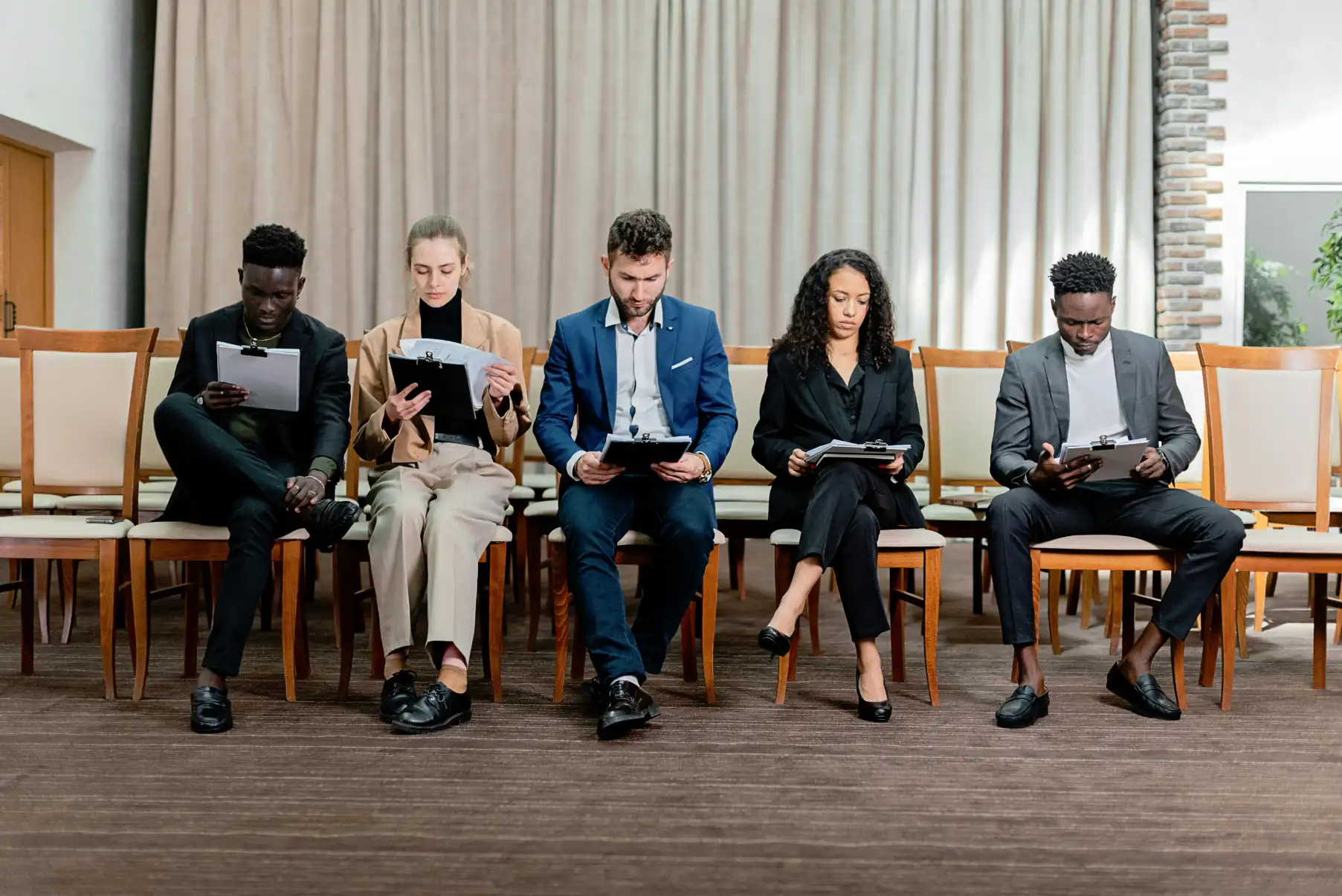 Recruitment officer reviewing resumes and managing hiring pipelines for telecom roles