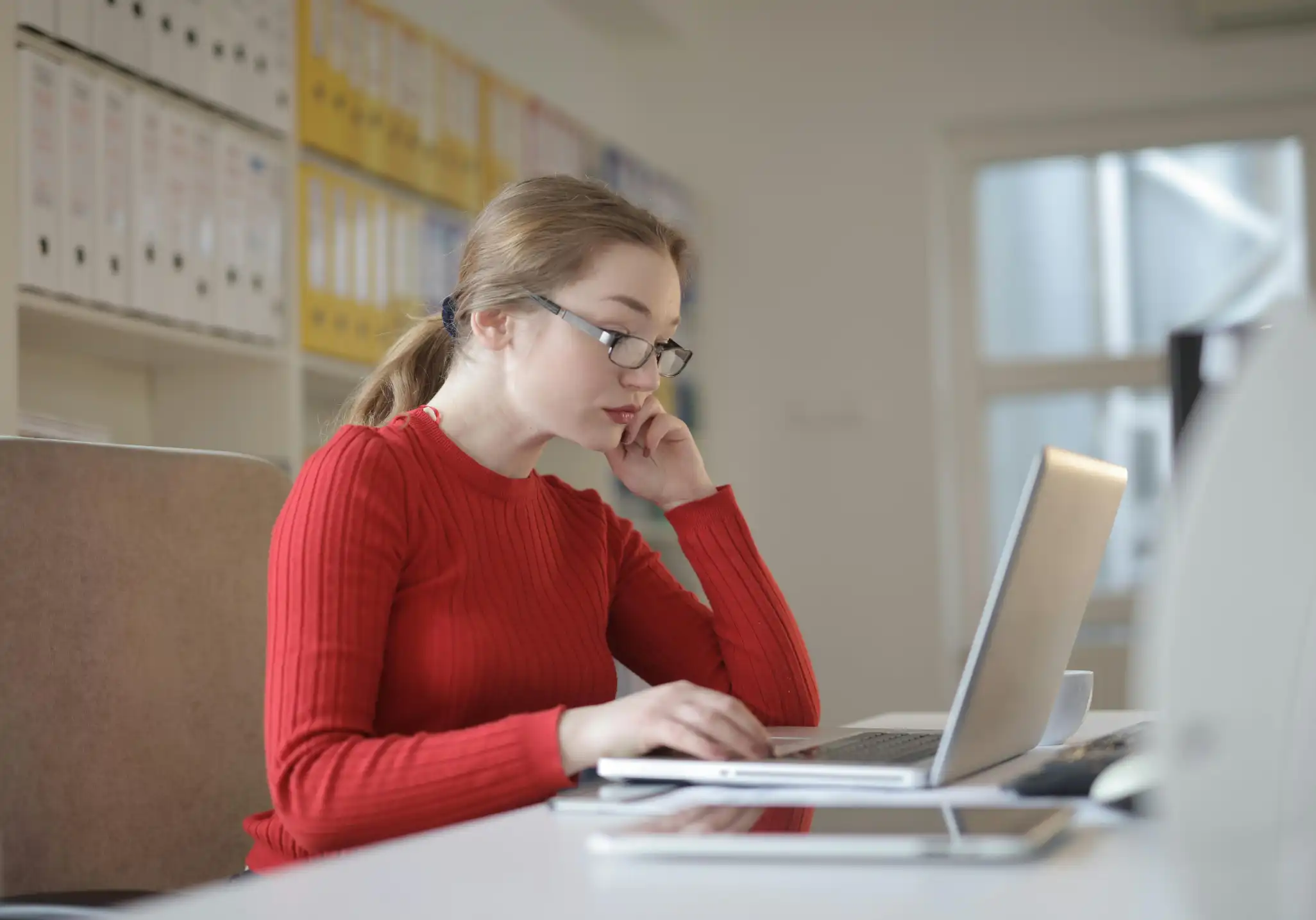 Finance office manager organizing admin workflows and financial coordination