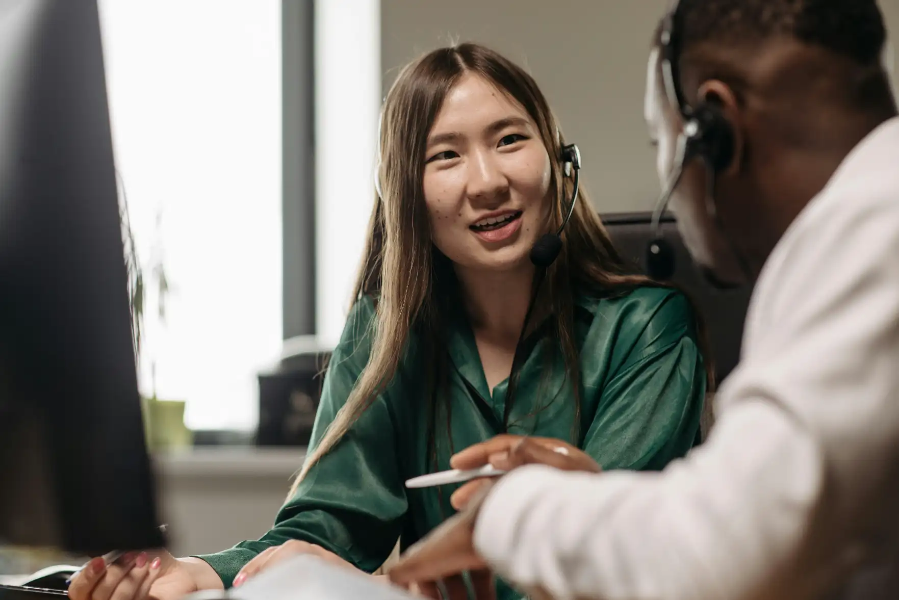 Customer service representative assisting energy and utilities customers