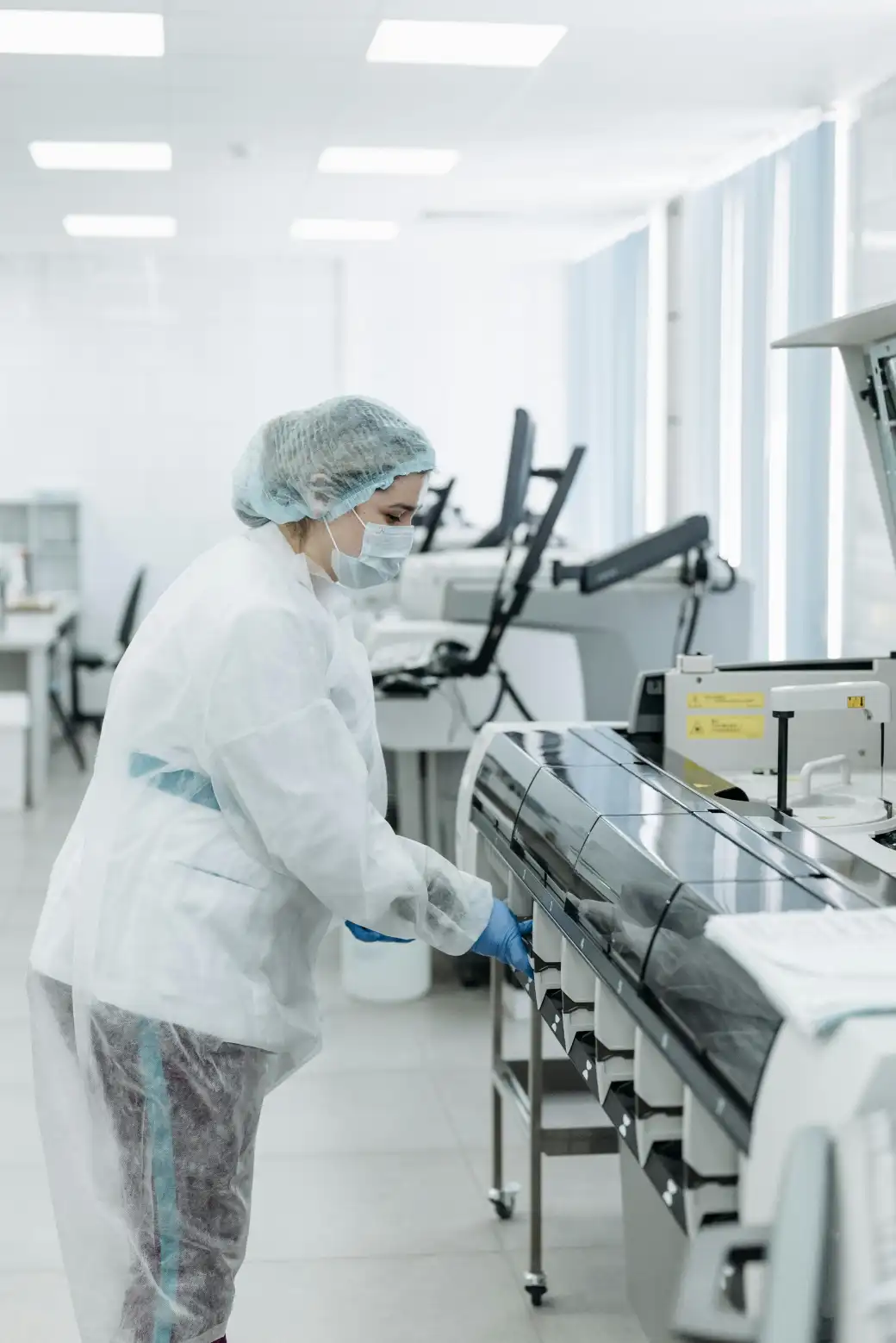 Clinical trial coordinator organizing pharmaceutical study documents and patient schedules
