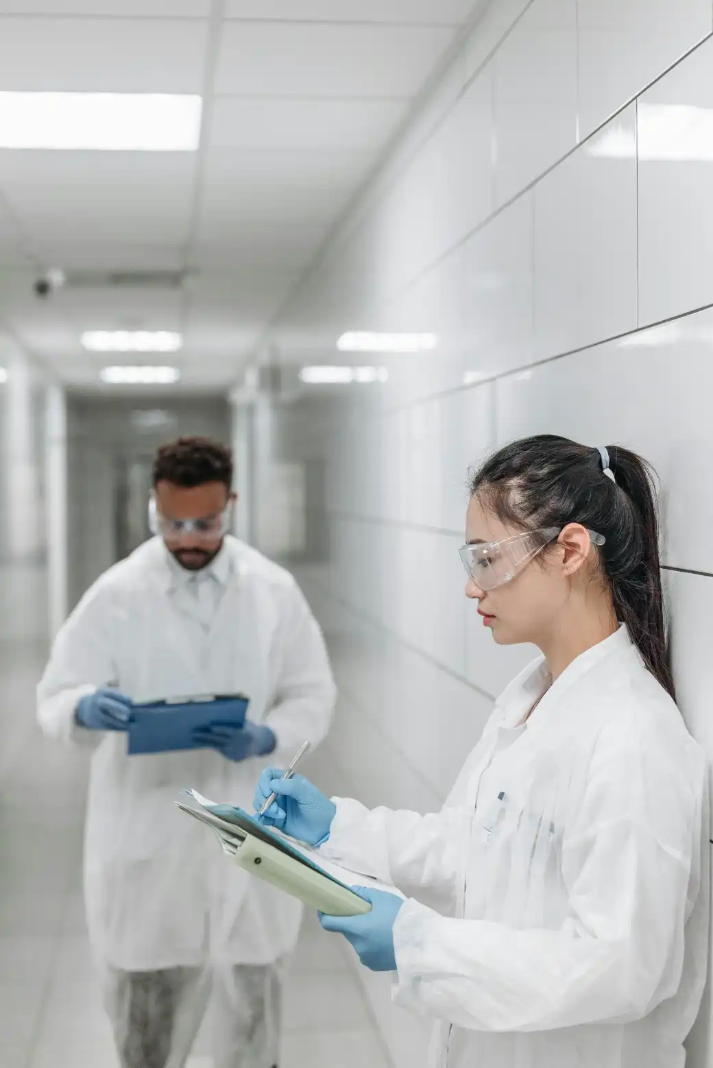 Quality Assurance Specialist reviewing manufacturing standards