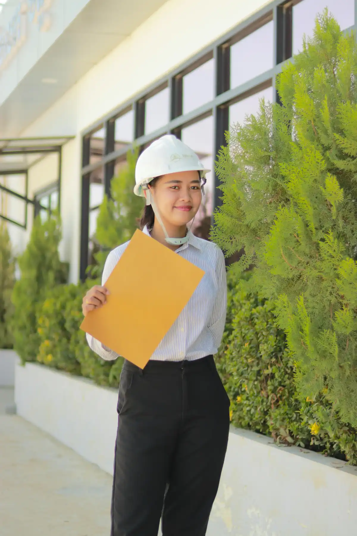 Contract Compliance Officer managing construction agreements