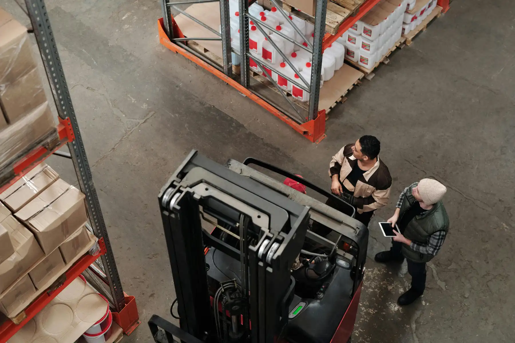 Construction supply chain coordinator reviewing materials and logistics